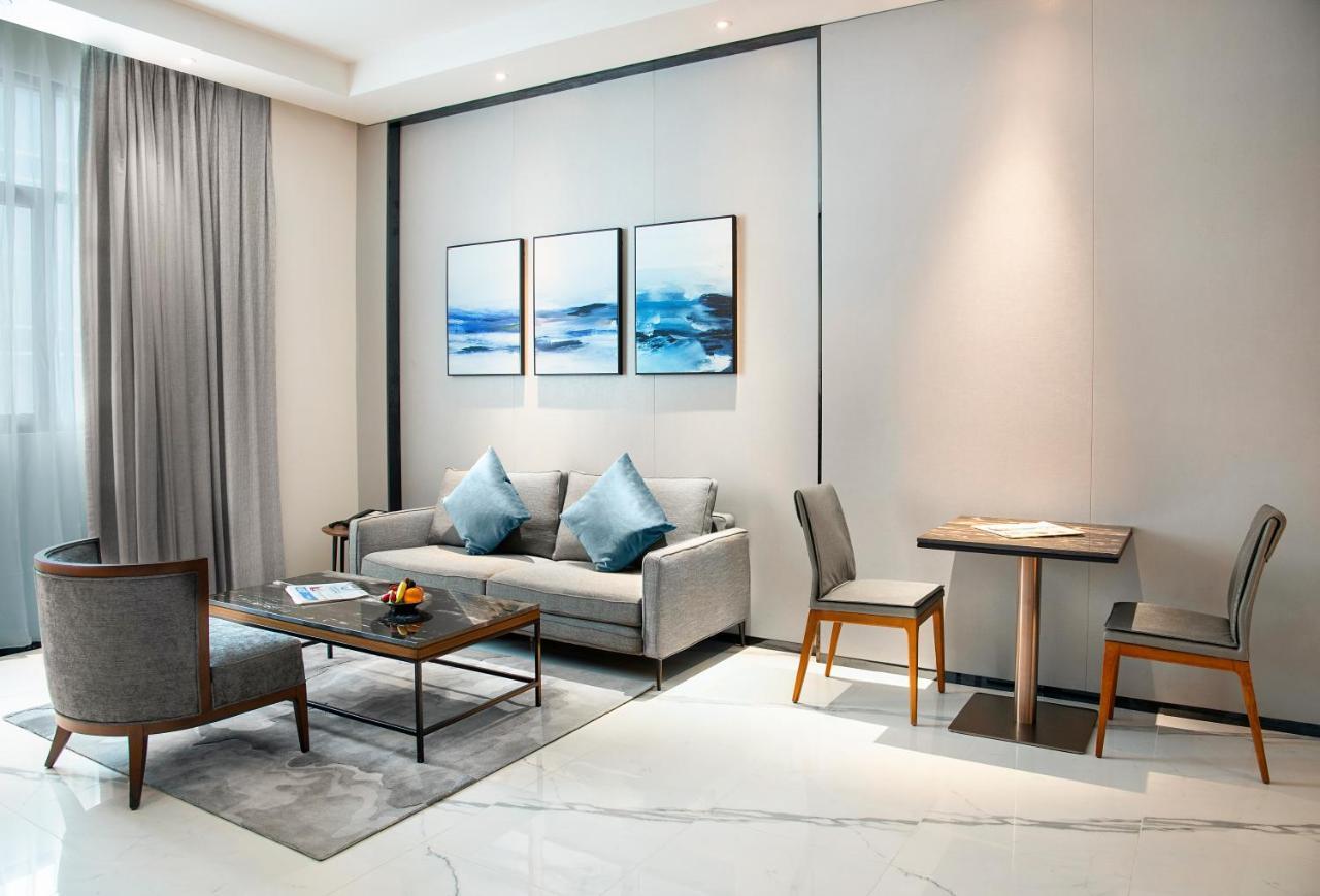 Asiana Grand Hotel Dubaj Kültér fotó A living room at the hotel