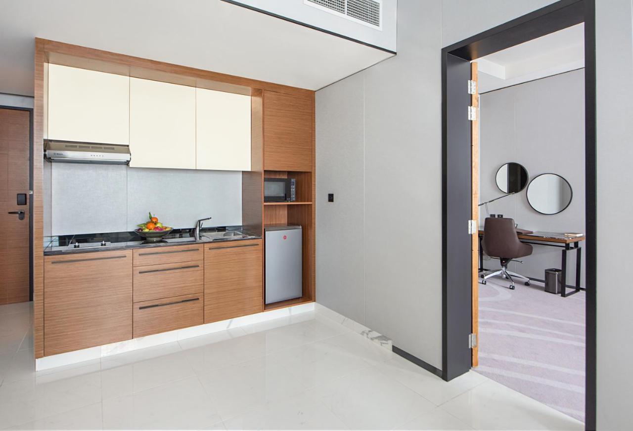 Asiana Grand Hotel Dubaj Kültér fotó A kitchenette in a hotel
